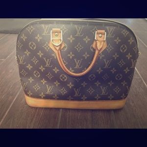 Authentic Louis Vuitton Alma handbag